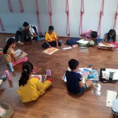 Another view of our busy classroom. I ensure each student gets the space and materials they need to practice their drawing and painting techniques effectively.