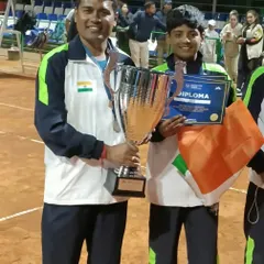 A proud moment for me and the academy, celebrating Rishikesh Mane's silver medal win with Team India. This achievement at the ITF Asia 12 & Under finals shows our program builds players ready for international competition.