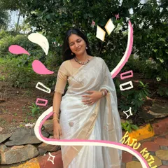 Feeling like Kaju Katli in this beautiful white and gold saree. I love adding doodles that match the vibe of my traditional outfits.
