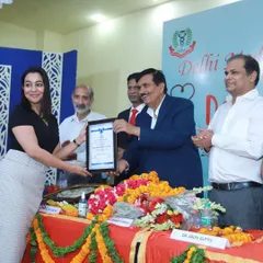 Here I am accepting the Swasthya Ratan Award at the Delhi Medical Association's Doctor's Day celebrations. This recognition from my peers in the medical community means a great deal to me.