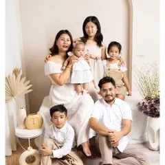 A family is a story of love, and my goal is to capture a beautiful chapter. This portrait showcases the warmth and connection of a multi-generational family, creating a true legacy heirloom.