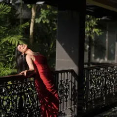A moment of pure joy captured in the sunlight. This shot from a photoshoot shows my natural and expressive side, perfect for lifestyle brands that want to convey happiness and authenticity.