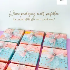 Where packaging meets perfection. This image showcases a bulk order of gifts wrapped in beautiful ombre paper with delicate heart details. Each box is finished with a hand-tied organza bow, showing that even large orders receive my full attention to detail.