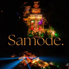 An epic aerial drone shot of the Samode Palace illuminated at night. Capturing the scale and grandeur of your destination venue is a key part of how I tell your wedding story.