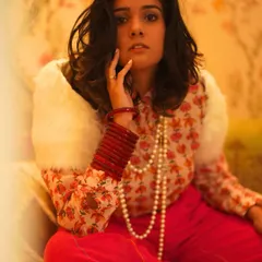 This is my Paris meets Mumbai look. I styled this hand-printed lotus mulmul shirt with khadi cotton rani pink pants. It's all about breathable fabrics that let your skin breathe in the summer heat.