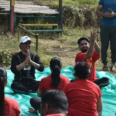 Sharing a moment of joy and connection during a yoga retreat with the Absolute Fit group. Practicing together outdoors builds a wonderful sense of community.