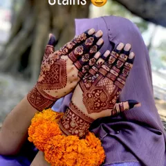 The stain is everything! This photo shows the beautiful dark color of the mehndi after a day, set against a natural background.