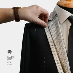 "Made just for you." A bespoke suit is a collaboration. I take precise measurements to ensure that the final garment fits you perfectly, flattering your form and reflecting your personal style.