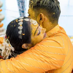 A candid embrace during our Haldi ceremony. His simple striped yellow kurta was the perfect match for my bright yellow saree, keeping the look cohesive and effortlessly joyful.