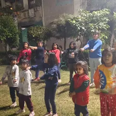 Young students practice basic punching and blocking drills. These exercises help develop muscle memory and coordination, which are fundamental to martial arts.