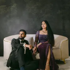 A fine-art portrait capturing a couple's distinct yet complementary energies. She brings the lightness, he brings the calm, and together they create a perfect, harmonious balance against a moody, enchanting backdrop.
