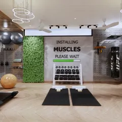 This home gym is designed to inspire. The space includes a dedicated area for weights with a motivational graphic on the wall, a vertical garden for a touch of nature, and state-of-the-art equipment.