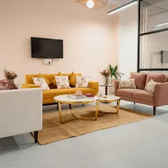 The client meeting area in our new office. We designed this space to be warm and welcoming, a place to build relationships and create beautiful things together.