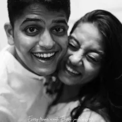 This is what pure, unfiltered joy looks like. I live for these in-between moments of laughter, captured in timeless black and white to focus purely on the emotion and connection between two people.