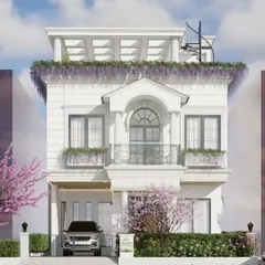For this home on the outskirts of Bengaluru, we created a paradise for a slower pace of life. The French neoclassical inspired elevation, with its elegant arches, clean white palette, and integrated greenery, provides a sense of calm and timeless beauty amidst a developing landscape.