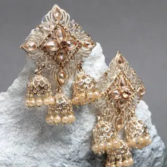 If we find anything interesting, it means somebody was involved with a lot of interest. These unique jhumkas feature a diamond-shaped Kundan stud and three delicate jhumka drops.