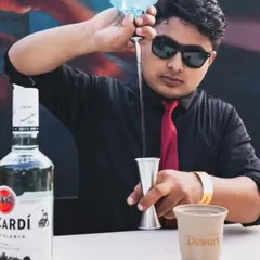 Our professional mixologists are masters of their craft, precisely measuring and mixing premium spirits from brands like Dewar's and Bacardi to create perfect cocktails for your guests.