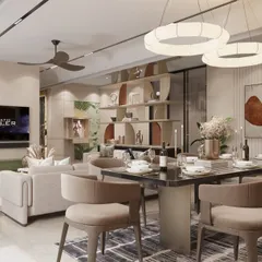 This open-plan living and dining area flows effortlessly, defined by sculptural lighting and a palette of soft neutrals and rust tones. The custom shelving unit acts as a functional art piece, dividing the space while maintaining an open feel.