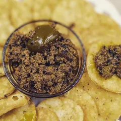 My Aam ka Achaar is where this whole journey started. Served here with some crispy mathri, this Banarasi-style mango pickle is made with a recipe my mother taught me. The leftover masala is just as delicious and can be used in other dishes!