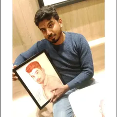 A happy client holding his framed blood portrait. It's always rewarding to see my art find a new home.