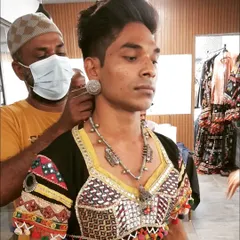 Getting ready behind the scenes for my role in "Monkey Man". This involved detailed, authentic costumes and makeup to fit the film's aesthetic.