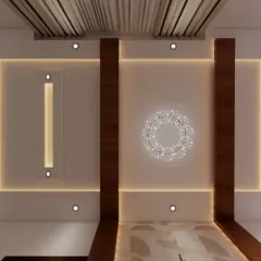 This false ceiling design features a central crystal-like light fixture, surrounded by a square-patterned cove lighting.