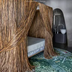 For Project 86, we brought in this incredible cabana bed from Edra, the first of its kind in India. We placed it at an angle, breaking free from the walls to make it a true centerpiece. It’s surrounded by rattan shutters, creating a private, luxurious retreat within the master bedroom.