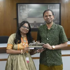 Receiving a token of appreciation from the faculty at Parul University after judging the "Vyang Chitra" cartoon competition. The talent of the students was truly impressive.