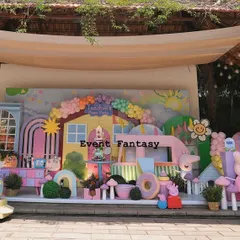 A slightly different angle of the expansive Peppa Pig setup, highlighting the train in the foreground and the detailed backdrop.