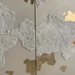 Another view of the gold leaf and texture panels. When hung together, they create a large, cohesive installation that is both modern and timeless.
