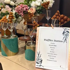 An elegant and inviting Waffles Station. Guests can customize their dessert with a variety of toppings, all served fresh and warm, making it a sweet and interactive experience.
