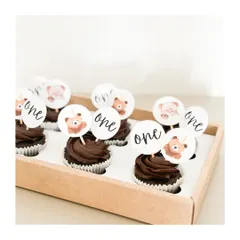 A bear-y sweet first birthday. These eggless chocolate cupcakes with custom "one" and teddy bear toppers are perfect for treating little guests.