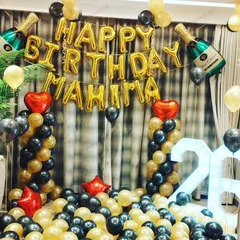 26th birthday ke liye yeh ek black aur gold theme surprise party ka setup hai. Isme maine foil letter balloons, light-up numbers, aur champagne bottle foil balloons use kiye hain.