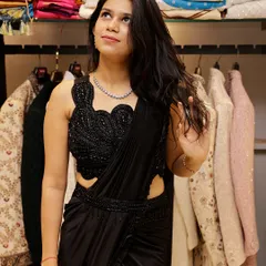 Here's another look at the black saree, focusing on the intricately beaded blouse. It's a statement piece that ensures you will look glamorous and sophisticated.
