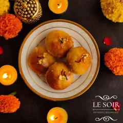 For Diwali, I created these Baadusha-inspired doughnuts. I use my soft doughnut dough to create a modern take on the traditional Indian sweet, soaked in a fragrant syrup.