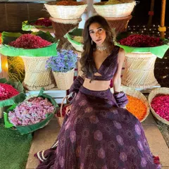 A beautiful purple lehenga for a wedding season that never seemed to end. I love the floral market-inspired decor.