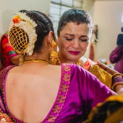 An emotional embrace between the bride and her mother. These are the precious, unscripted moments that make a wedding so memorable.