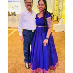 My loyal client Jeevitha looks stunning in this royal blue Anarkali gown. The design features contrasting embroidered sleeve cuffs and a traditional border at the hem.