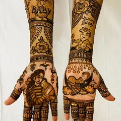 A sweet and detailed baby shower henna design. This piece includes a portrait of a mother holding her baby, another baby sleeping on the moon, and cute elements like a bunny and a 'Welcome Baby' message.