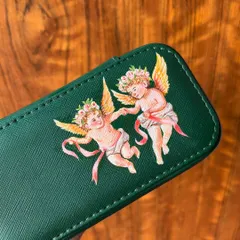 A close-up of the cherubs I painted. I love incorporating these timeless styles into my work and can't wait to create more pieces like this.