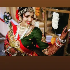 A happy bride on her wedding day, her hands telling a story. The rich stain of the mehandi is a testament to the purity of my natural, homemade henna paste.