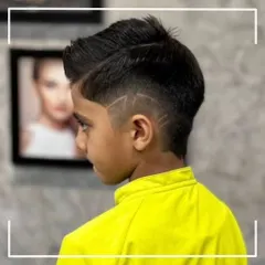 A side view of the creative hair tattoo design, showing the precision and skill of our stylists who make haircuts fun for kids.