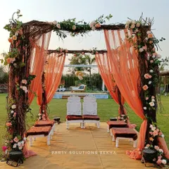 For couples who dream of a natural, romantic setting, I design rustic mandaps like this one. The structure of intertwined branches, soft peach draping, and delicate floral accents creates an earthy yet elegant space for the sacred wedding ceremony.