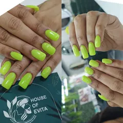 A full set of striking neon lime green nails. This color is bright, bold, and guaranteed to get you noticed. It shows my flawless application of vibrant gel polish.