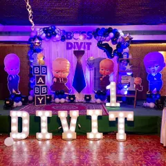 Here is our popular 'Boss Baby' themed decoration for a first birthday party. We provide everything from the character standees and custom name lighting to the coordinated balloon backdrop, creating an immersive experience for your little one.