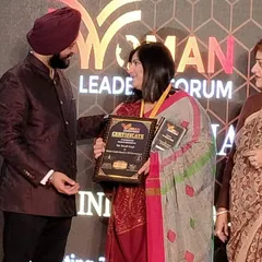 Receiving my certificate at the Woman Leaders Forum. Every step of this journey is dedicated to the women I work with.