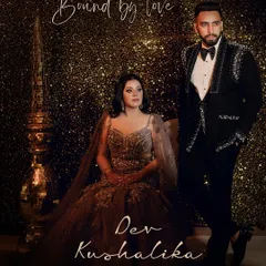 A powerful couple portrait that exudes glamour and confidence. The dark, sparkly background and their coordinated formal wear create a high-fashion, editorial feel for this engagement shoot.