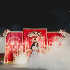 A grand reception entrance filled with smoke and sparklers. We create these dramatic, movie-like shots to give your wedding photos a truly epic feel.