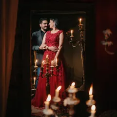 A reflection of romance, lit by candlelight. This image showcases our ability to create a dramatic, moody, and cinematic atmosphere for a truly glamorous pre-wedding look.