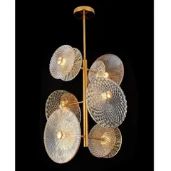 A multi-light pendant with fluted glass discs. This fixture is perfect for adding a touch of art deco glamour to a living room or dining area.